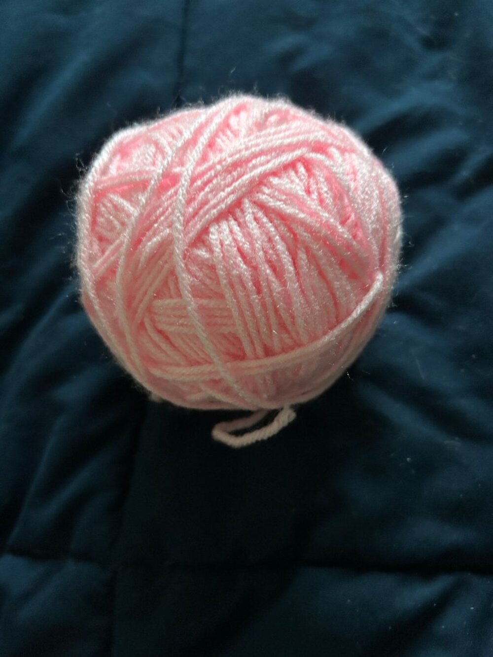 pail pink ball of yarn